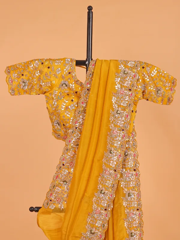 Mustard yellow saree in shimmer tissue silk