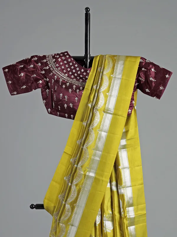 Mustard yellow saree with embroidered blouse charm