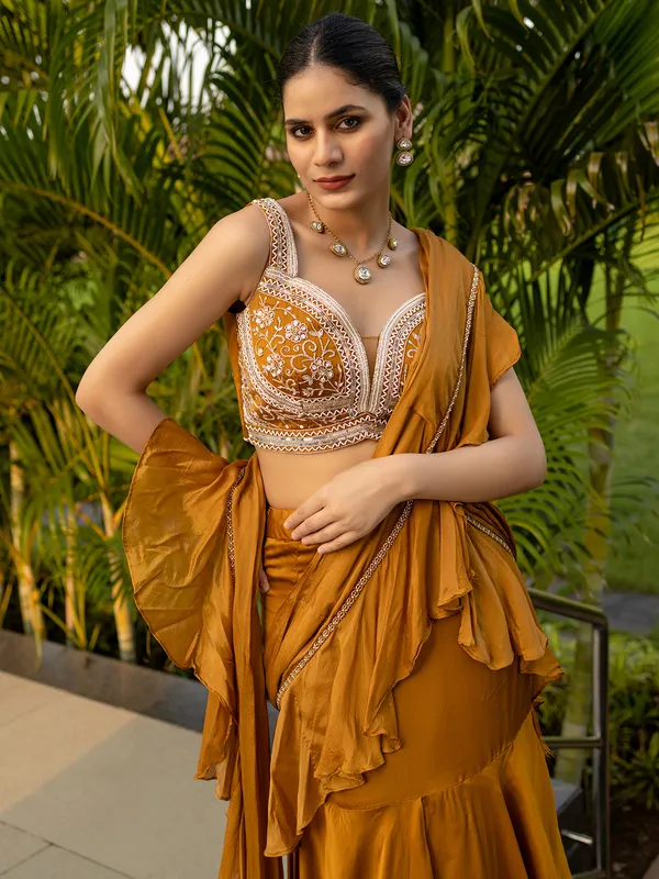 Mustard yellow satin silk saree for reception