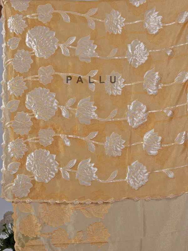 Mustard yellow semi tissue silk saree with zari highlights