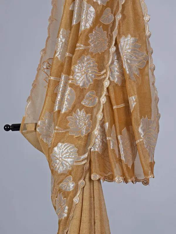 Mustard yellow semi tissue silk saree with zari highlights