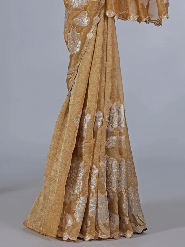 Mustard yellow semi tissue silk saree with zari highlights