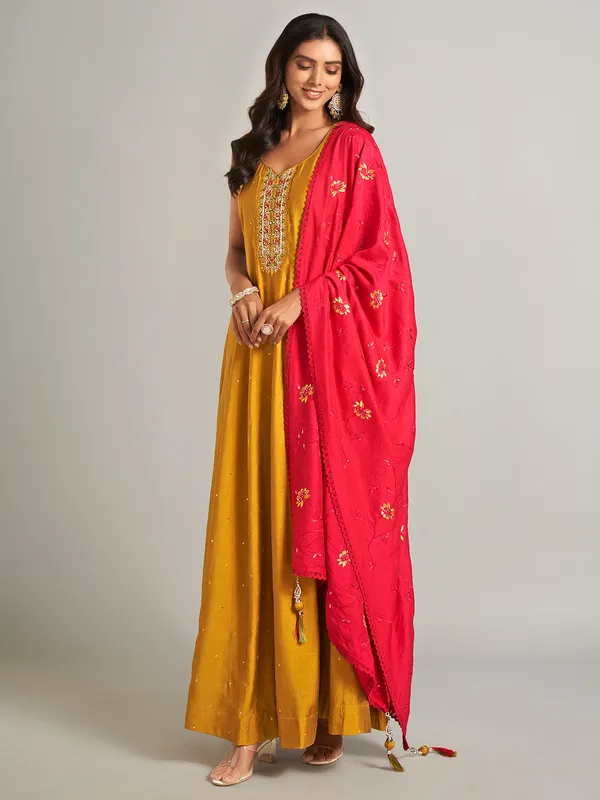 Mustard yellow silk anarkali salwar suit