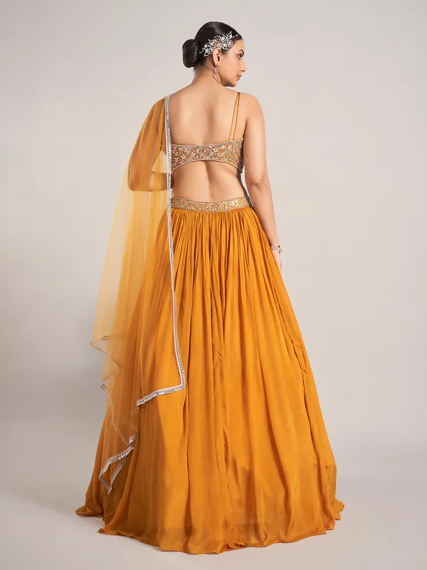 Mustard yellow silk haldi and wedding lehenga choli