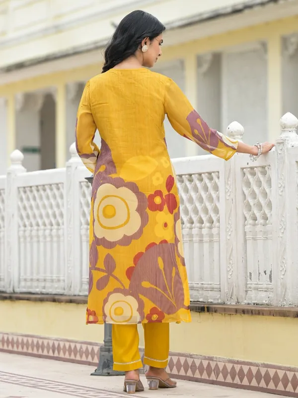 Mustard yellow silk kurti set in printed for festive wear