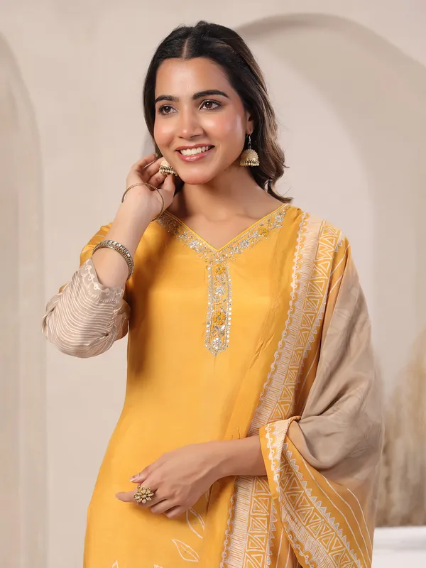 Mustard yellow silk kurti set with cutdana work