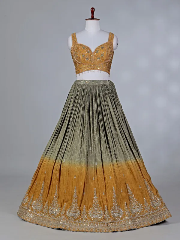 Mustard yellow silk lehenga choli with aabla work
