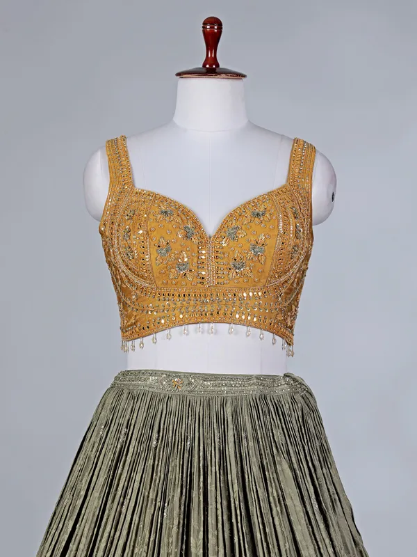 Mustard yellow silk lehenga choli with aabla work