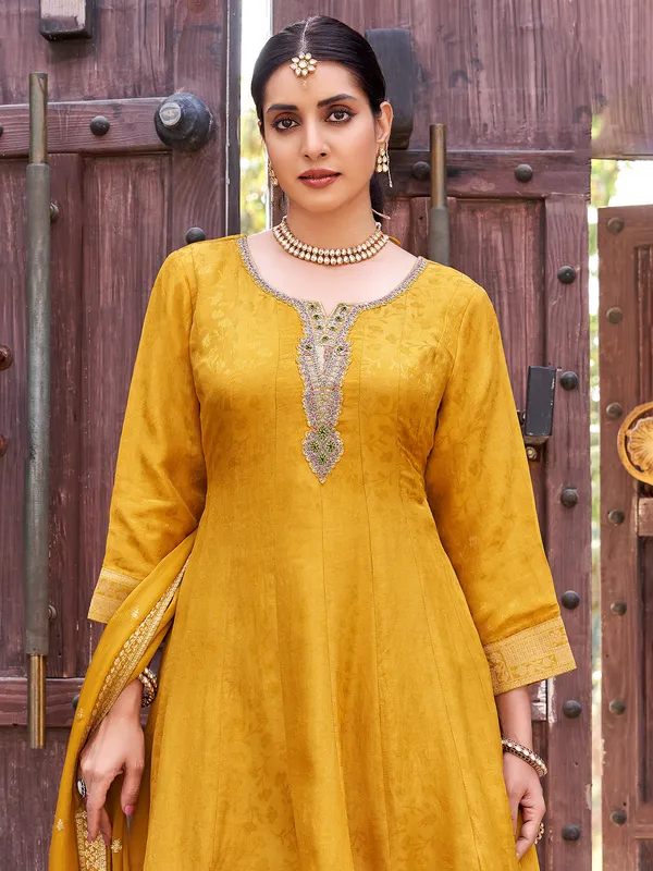 Mustard yellow silk palazzo suit with dupatta