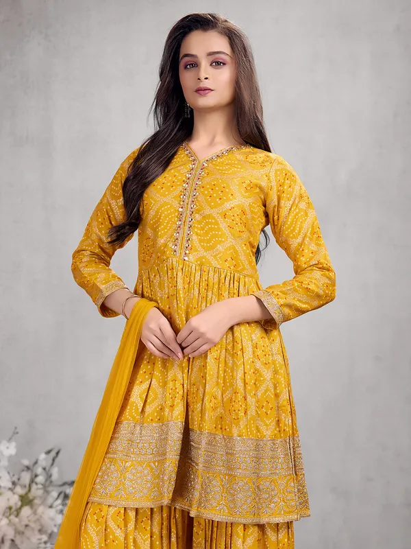 Mustard yellow silk palazzo suit with zardosi work for wedding