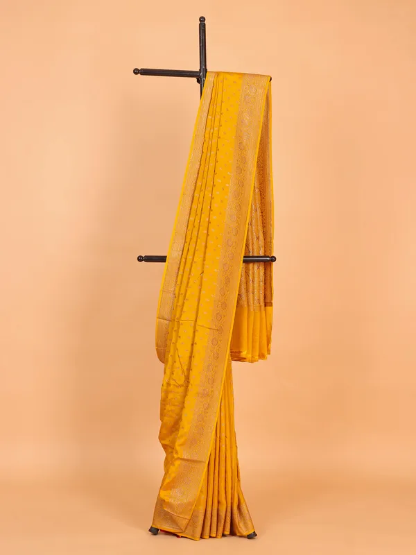 Mustard yellow silk saree with contrast blouse