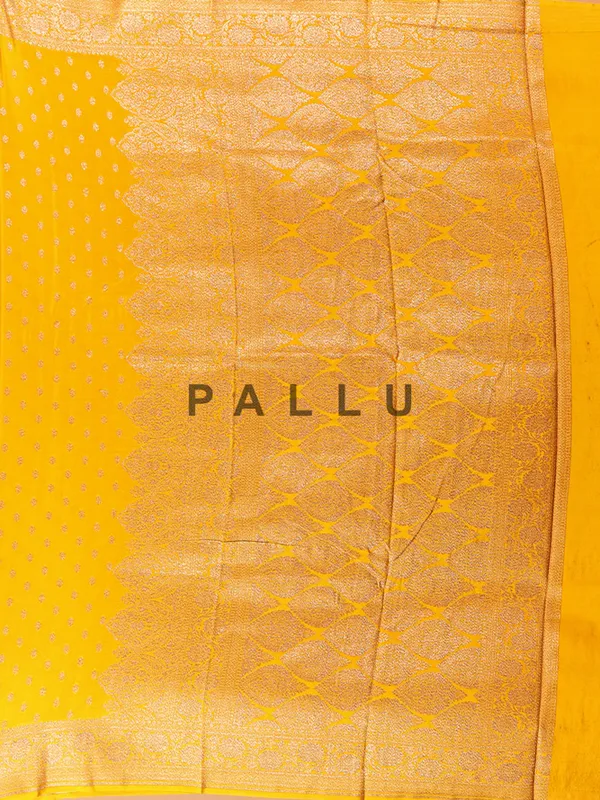 Mustard yellow silk saree with contrast blouse
