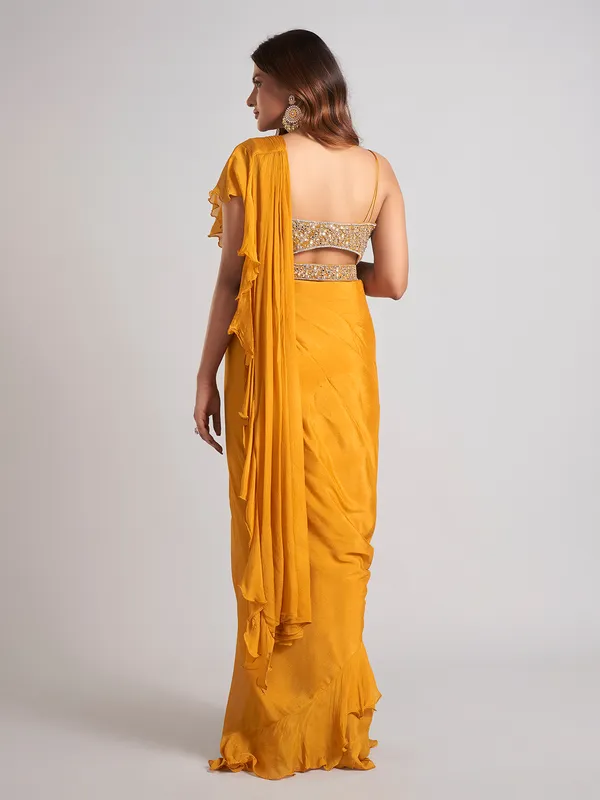 Mustard yellow silk saree with stone work