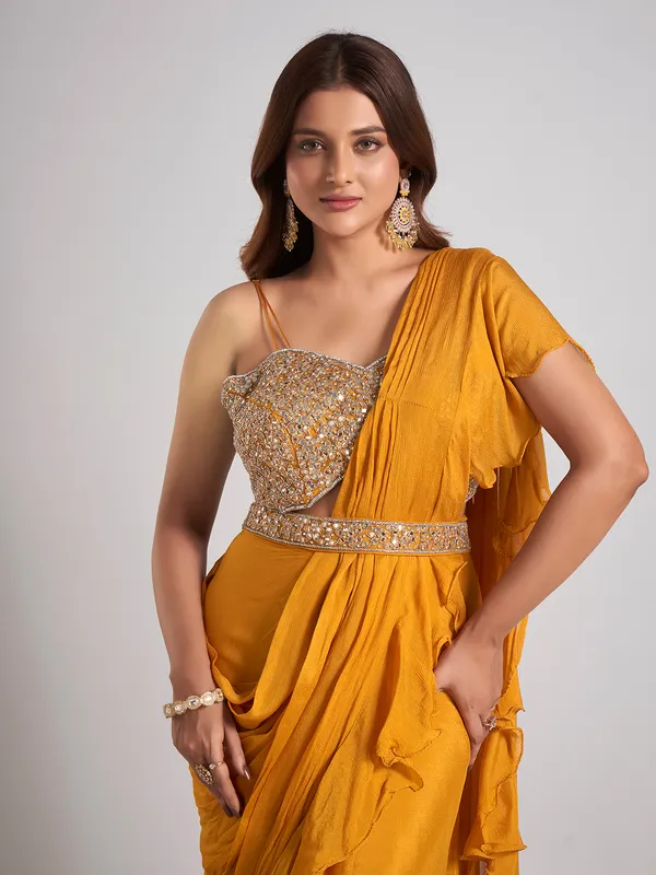 Mustard yellow silk saree with stone work