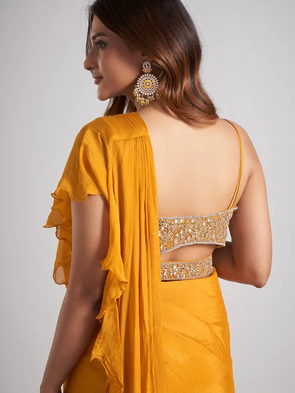 Mustard yellow silk saree with stone work