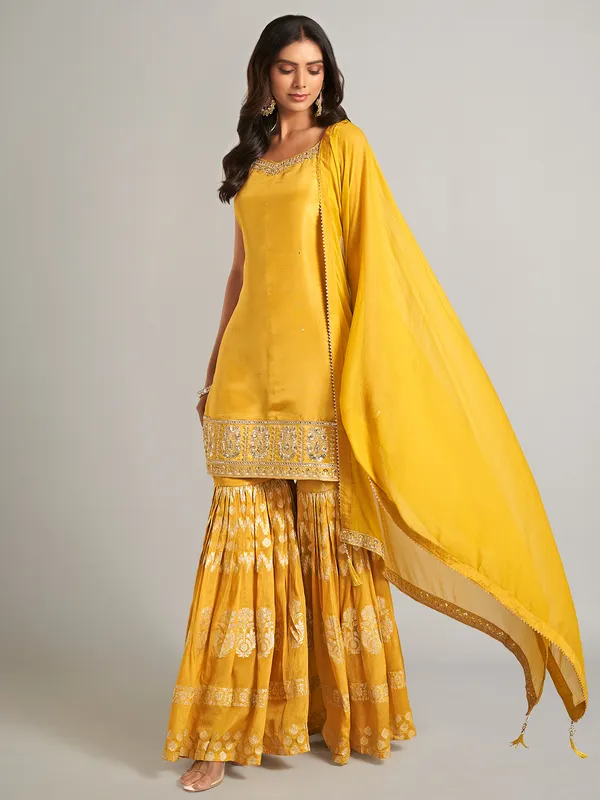 Mustard yellow silk sharara salwar suit for wedding