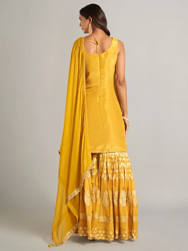 Mustard yellow silk sharara salwar suit for wedding