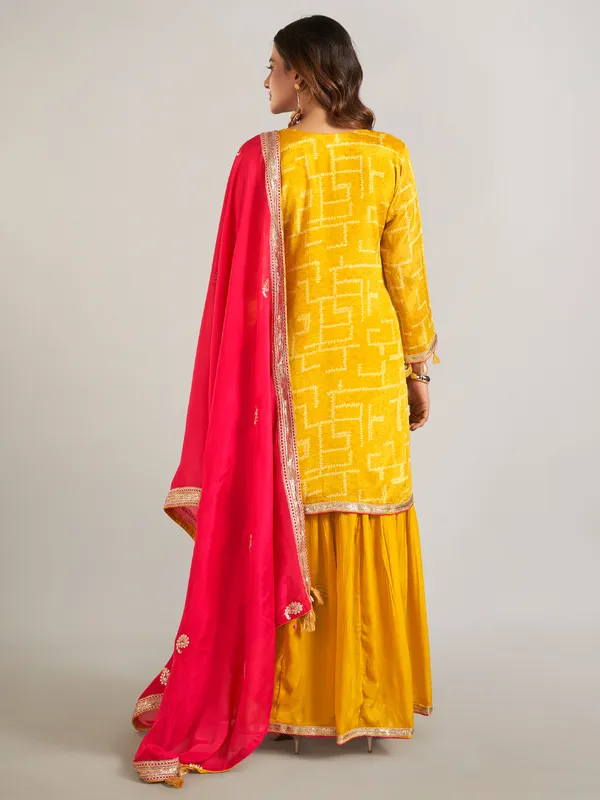 Mustard yellow silk sharara suit for women