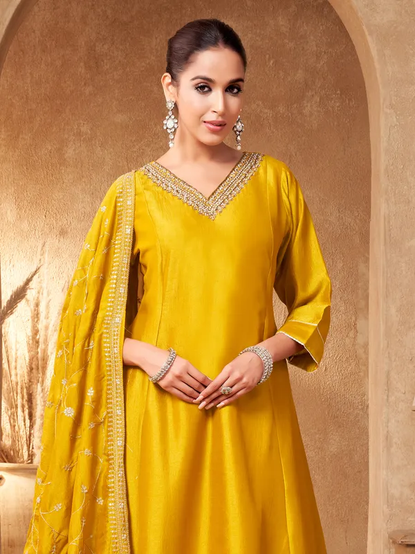 Mustard yellow silk zardosi festive suit