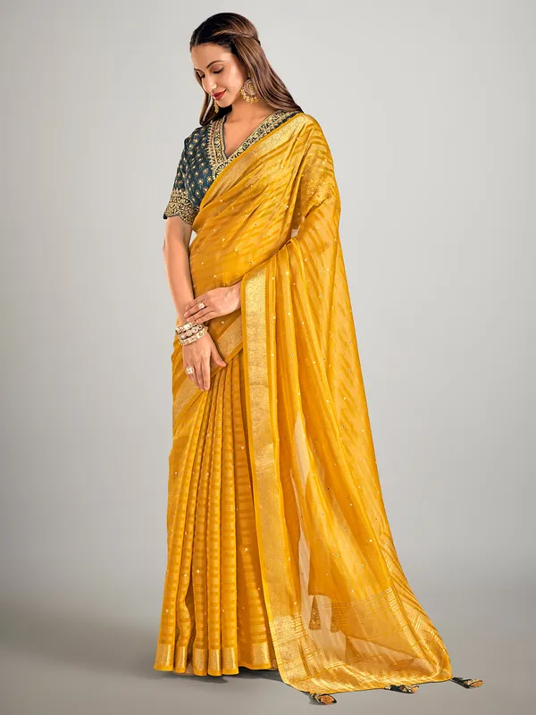 Mustard yellow soft organza saree