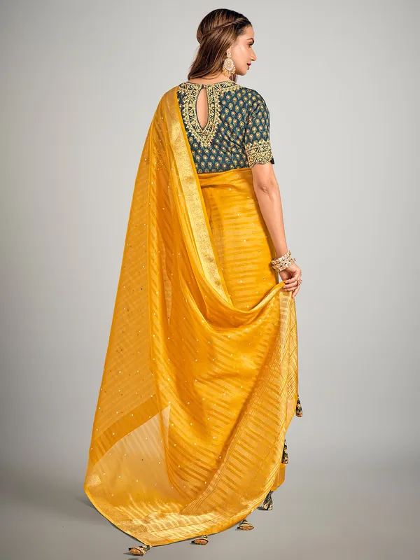 Mustard yellow soft organza saree