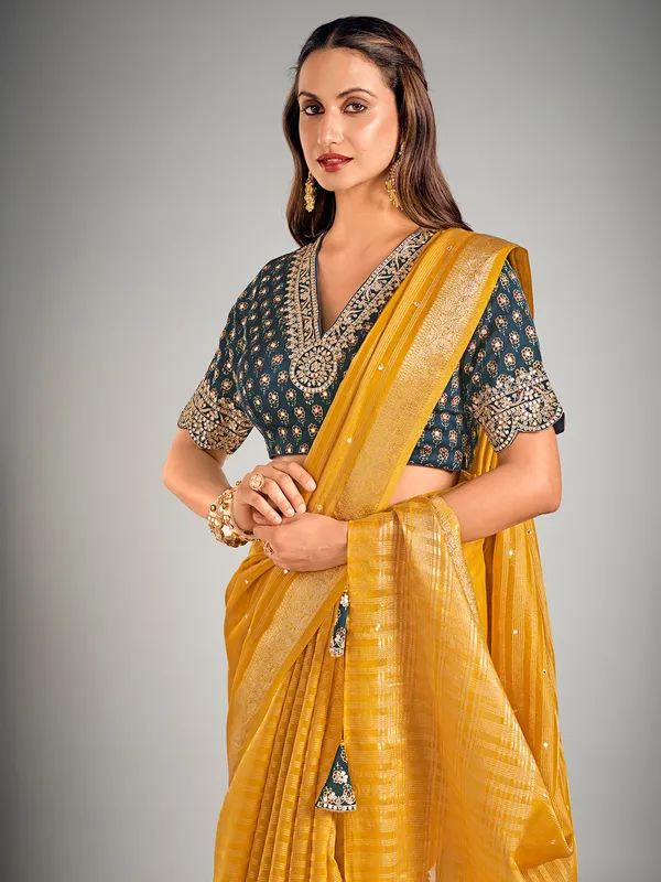 Mustard yellow soft organza saree