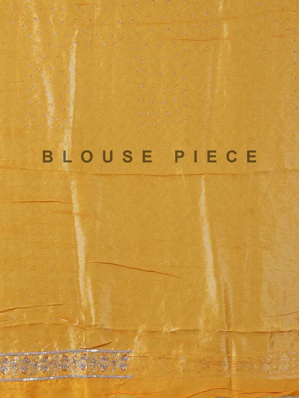 Mustard yellow tissue saree with cutdana work