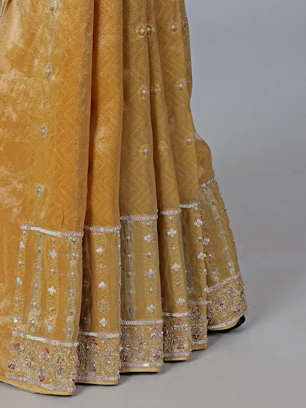 Mustard yellow tissue saree with cutdana work