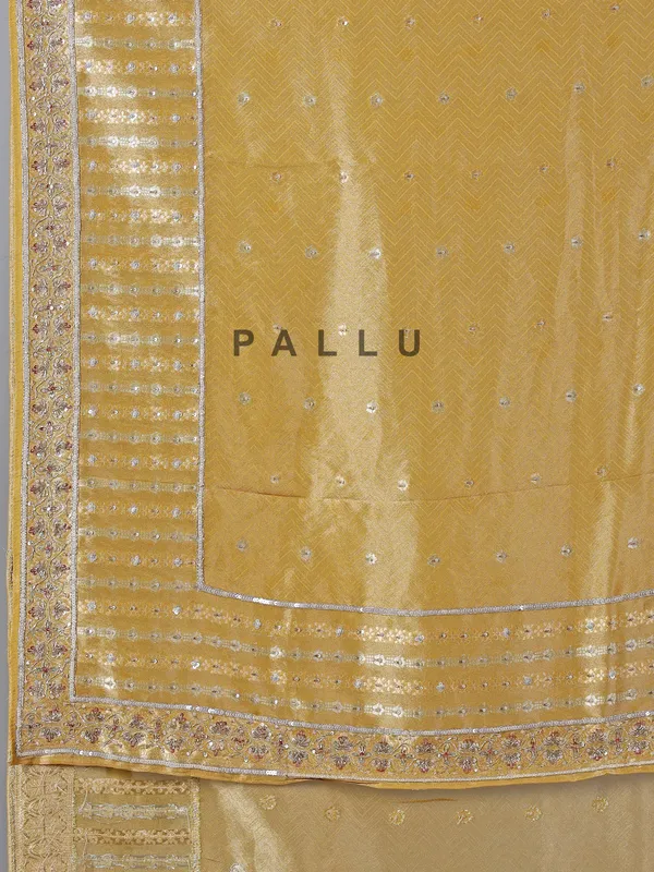 Mustard yellow tissue saree with cutdana work