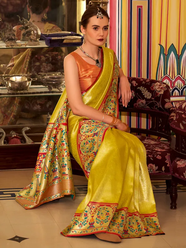 Mustard yellow tissue silk saree with zari weaving
