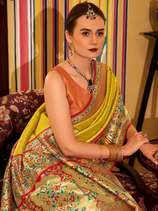 Mustard yellow tissue silk saree with zari weaving