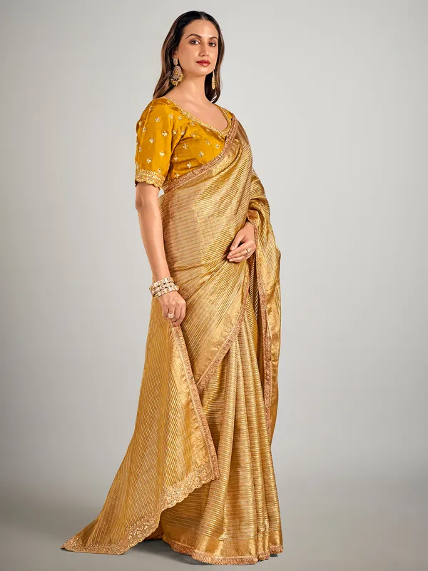 Mustard yellow tissue silk zari weaving saree