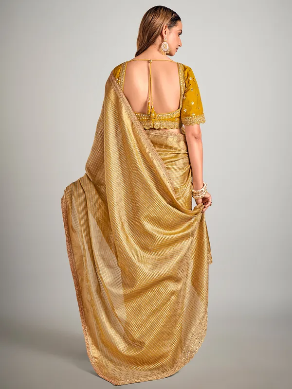 Mustard yellow tissue silk zari weaving saree