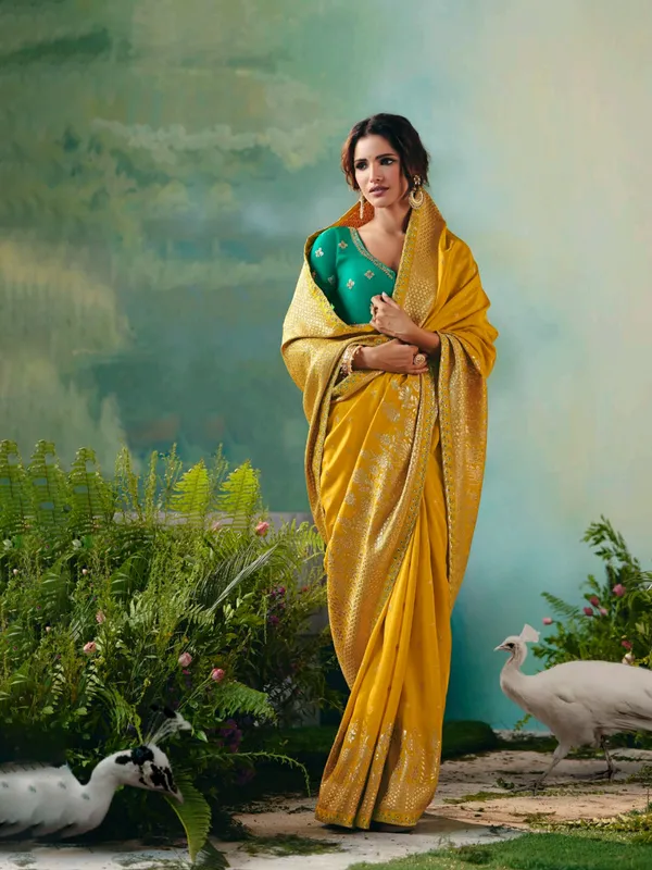 Mustard yellow viscose dola silk saree with zari work