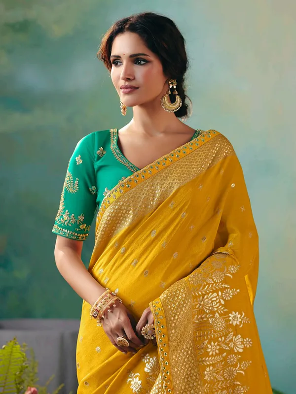 Mustard yellow viscose dola silk saree with zari work