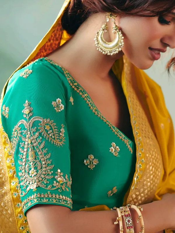 Mustard yellow viscose dola silk saree with zari work