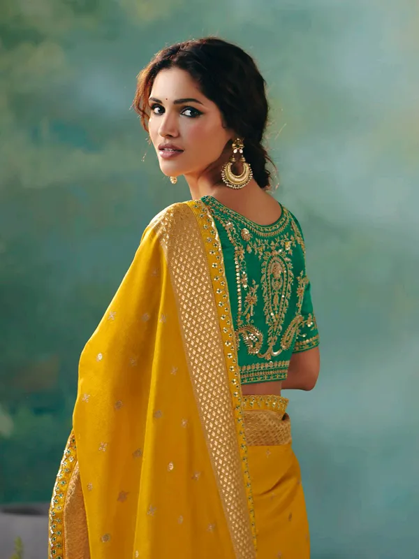 Mustard yellow viscose dola silk saree with zari work