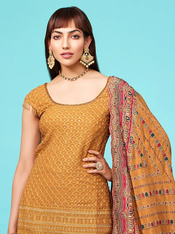 Mustard yellow wedding sharara suit in printed