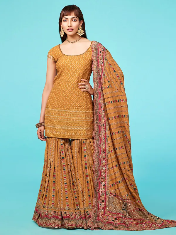 Mustard yellow wedding sharara suit in printed