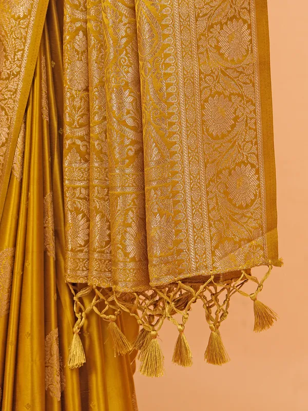 Mustard yellow zari weaving silk saree for festive