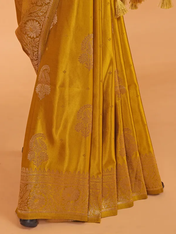 Mustard yellow zari weaving silk saree for festive