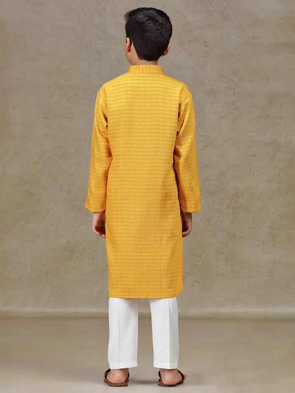 Mustard yellow zari worked silk kurta suit