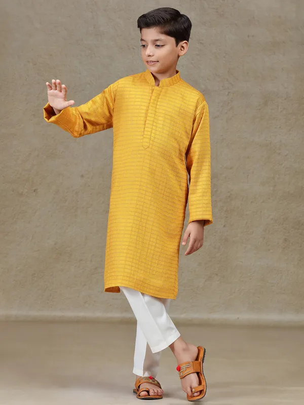 Mustard yellow zari worked silk kurta suit