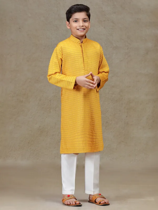 Mustard yellow zari worked silk kurta suit