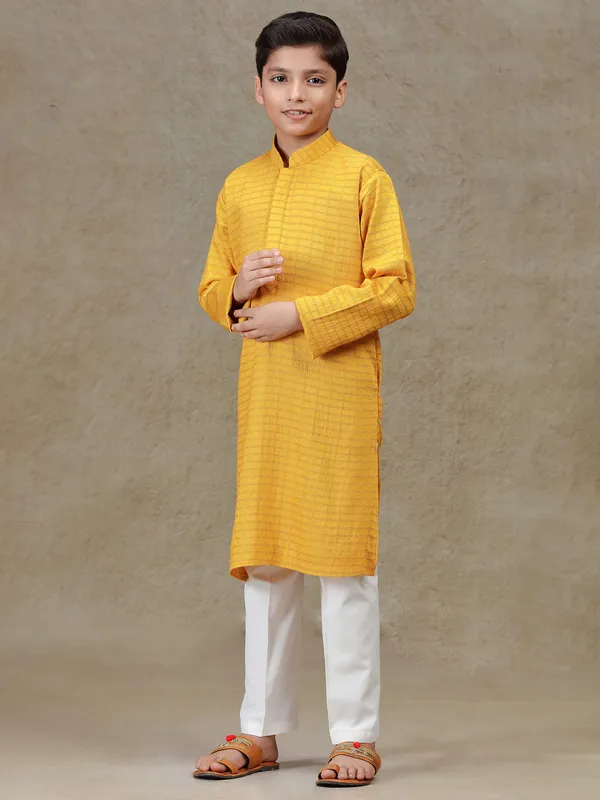 Mustard yellow zari worked silk kurta suit