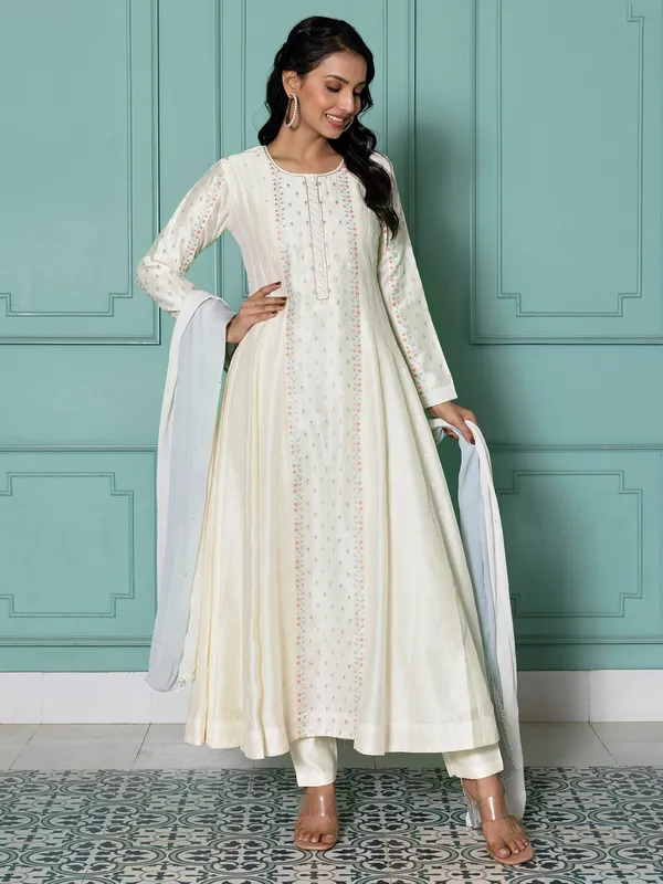 Stunning silk off-white salwar suit with dupatta
