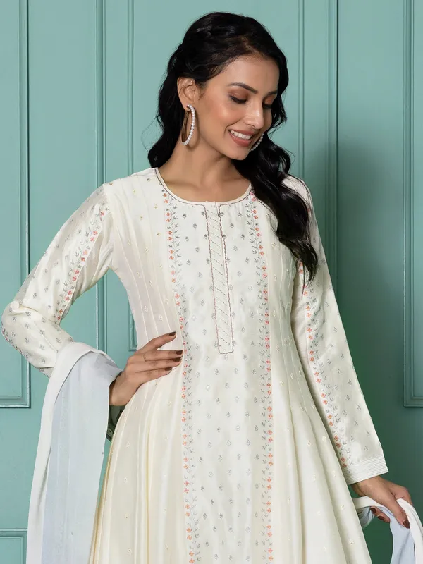 Stunning silk off-white salwar suit with dupatta