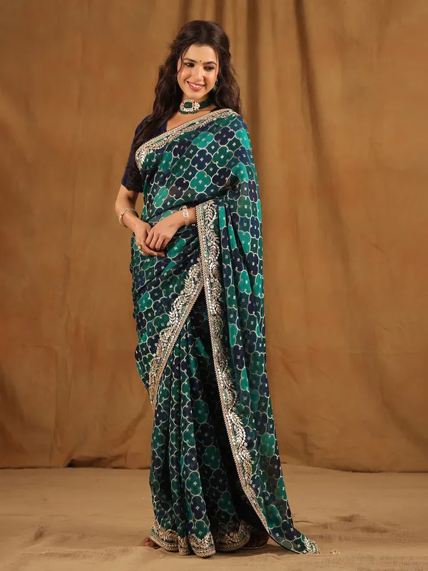 Navy and green georgette saree