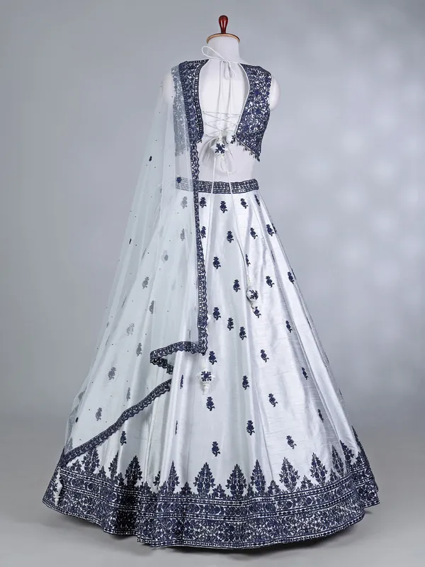 Navy and silver raw silk lehenga choli with net dupatta