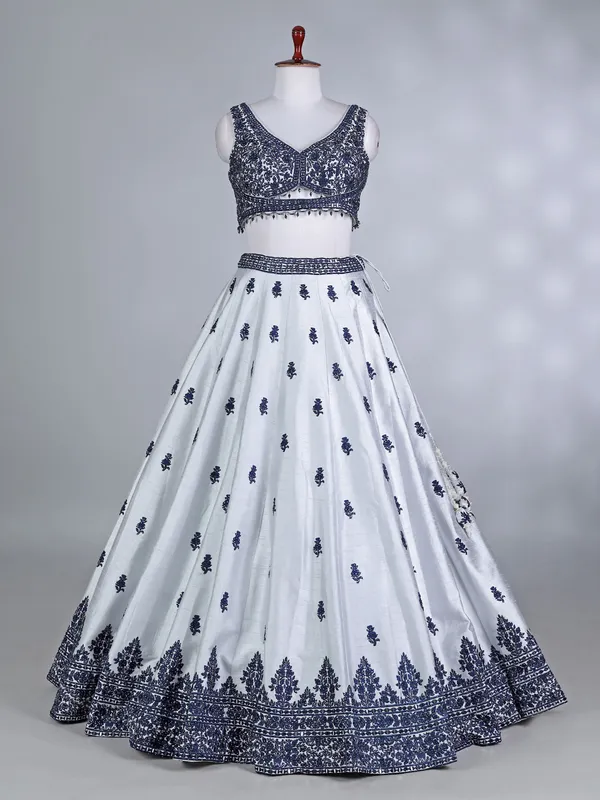 Navy and silver raw silk lehenga choli with net dupatta